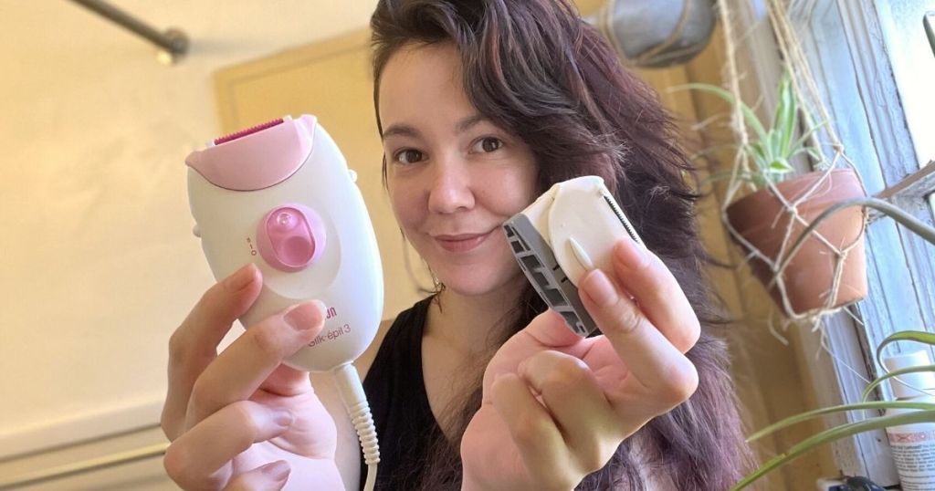 woman holding Braun Silk Epil 3 epilator