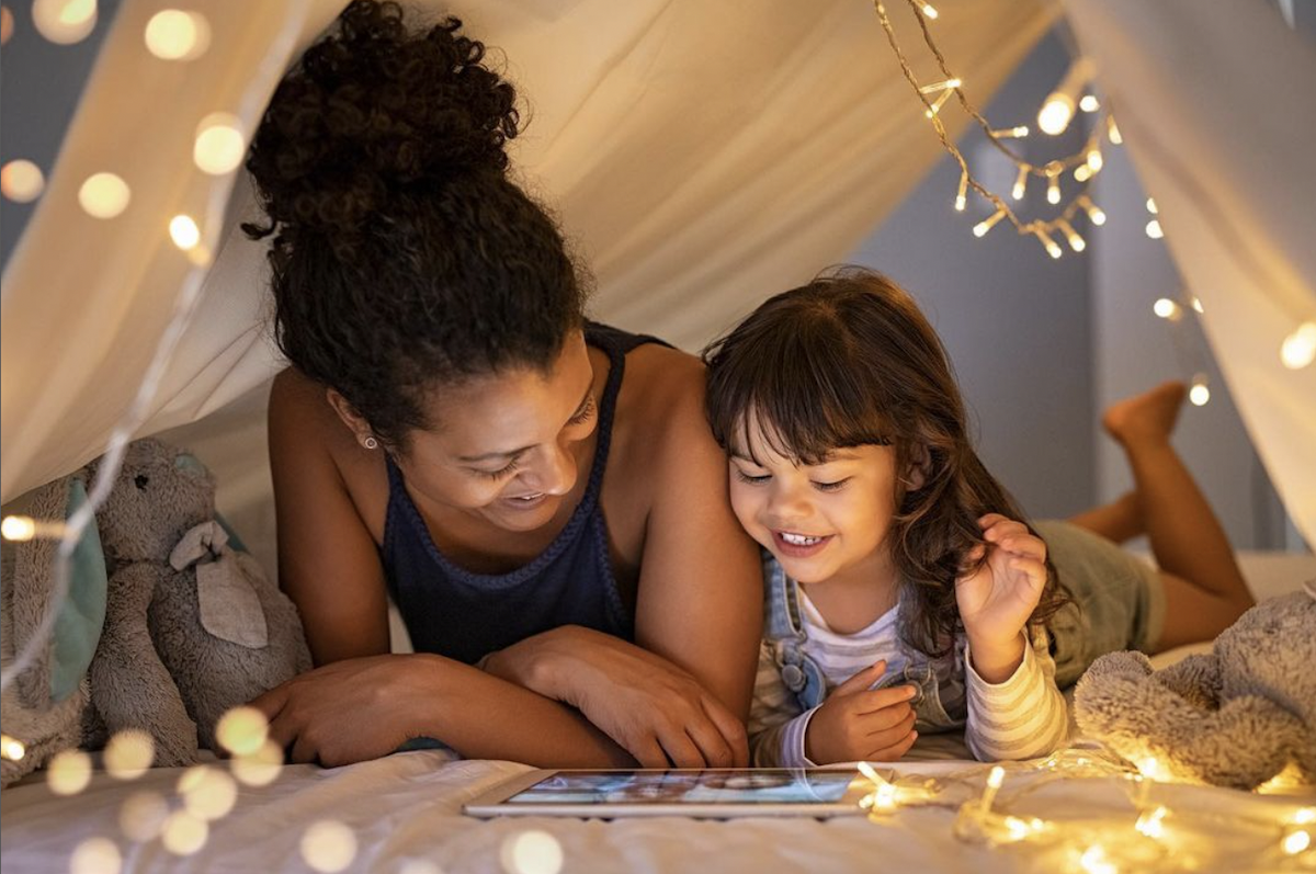 mother and daughter on tablet bestow life insurance