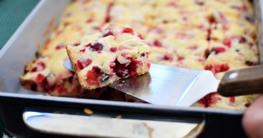 serving up a slice of cranberry christmas cake