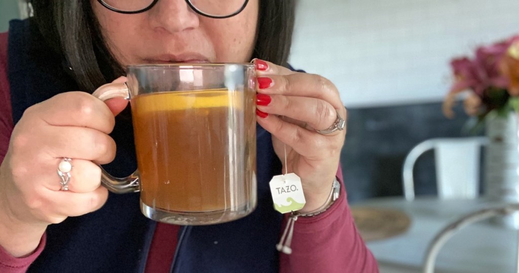 woman drinking a copycat starbucks medicine ball tea drink 