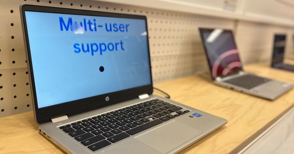 silver laptop on display 