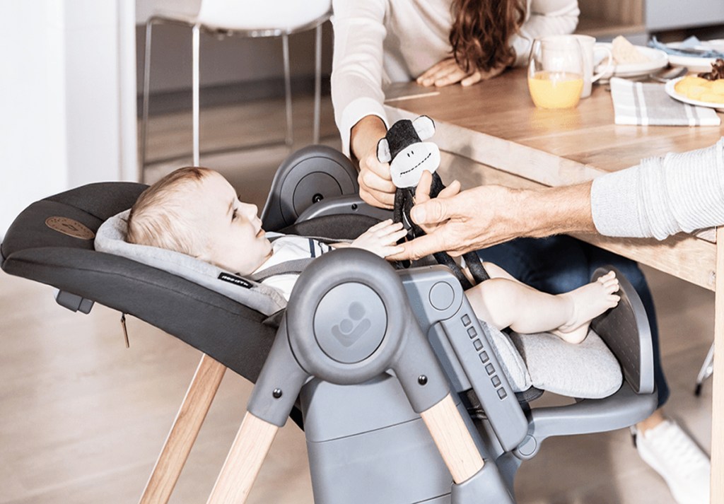 feeding baby in high chair