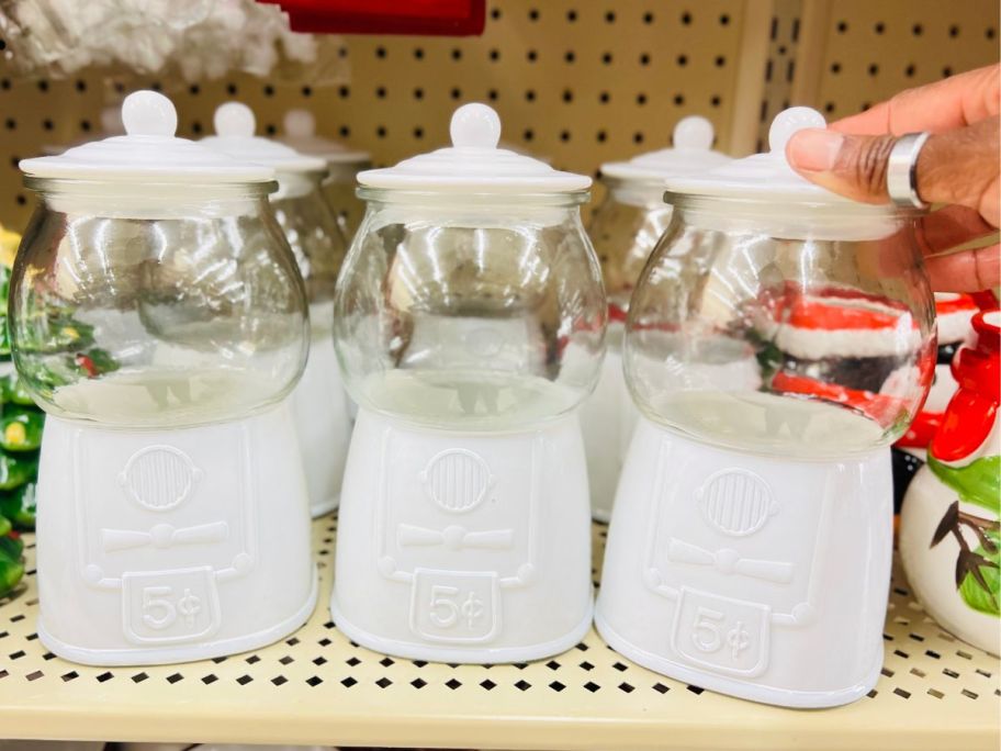 gumball machine candy jars on a store shelf