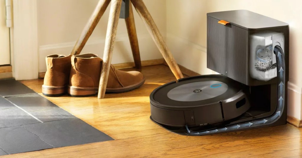 black robot vacuum on floor