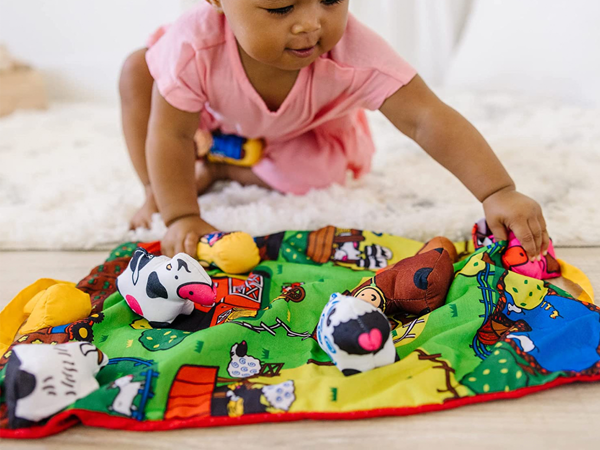 kids playing with melissa and doug take along toys