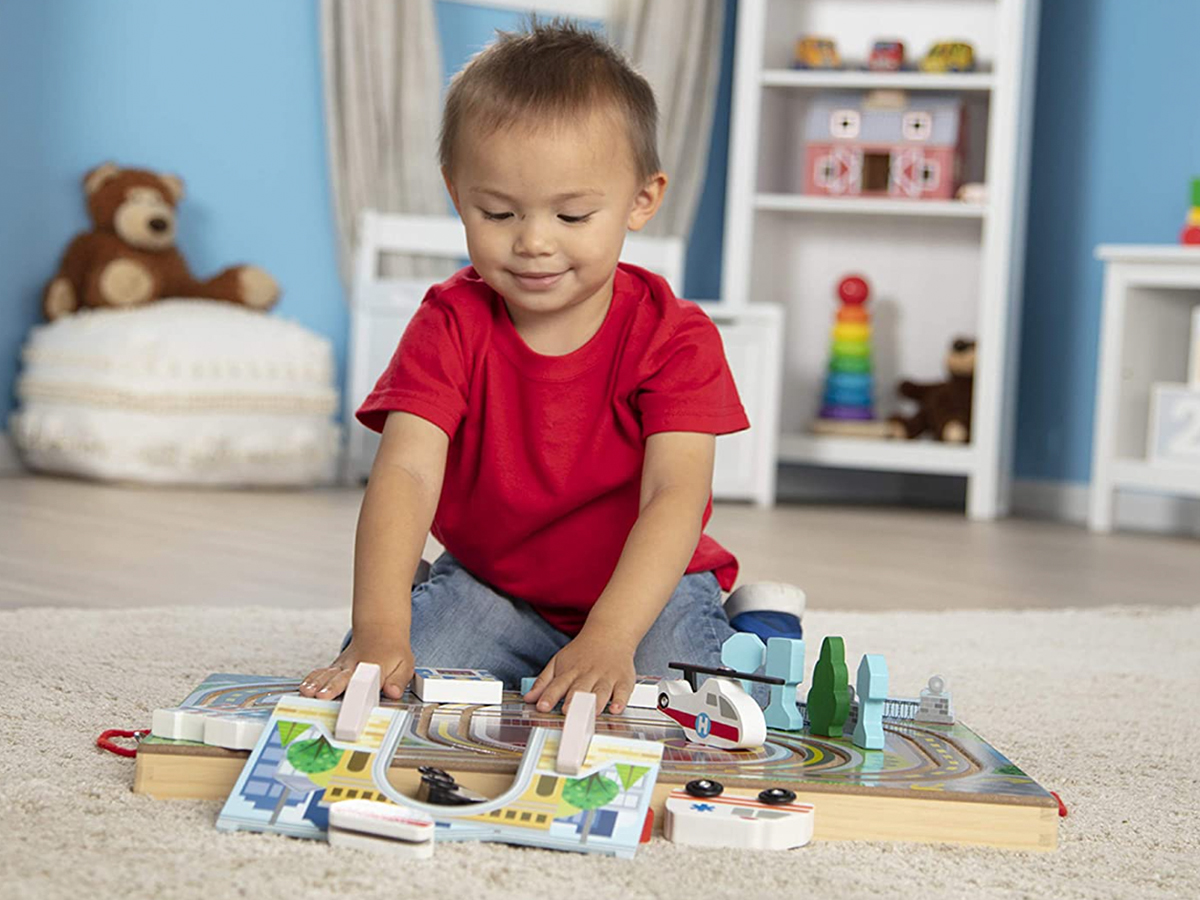 kids playing with melissa and doug take along toys