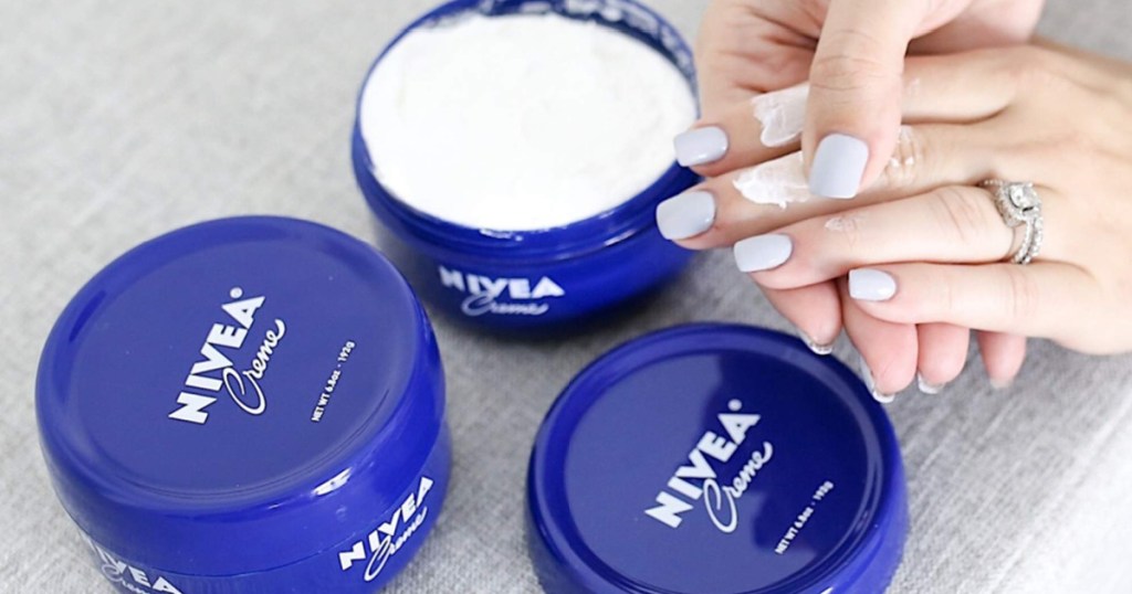 hands using nivea creme