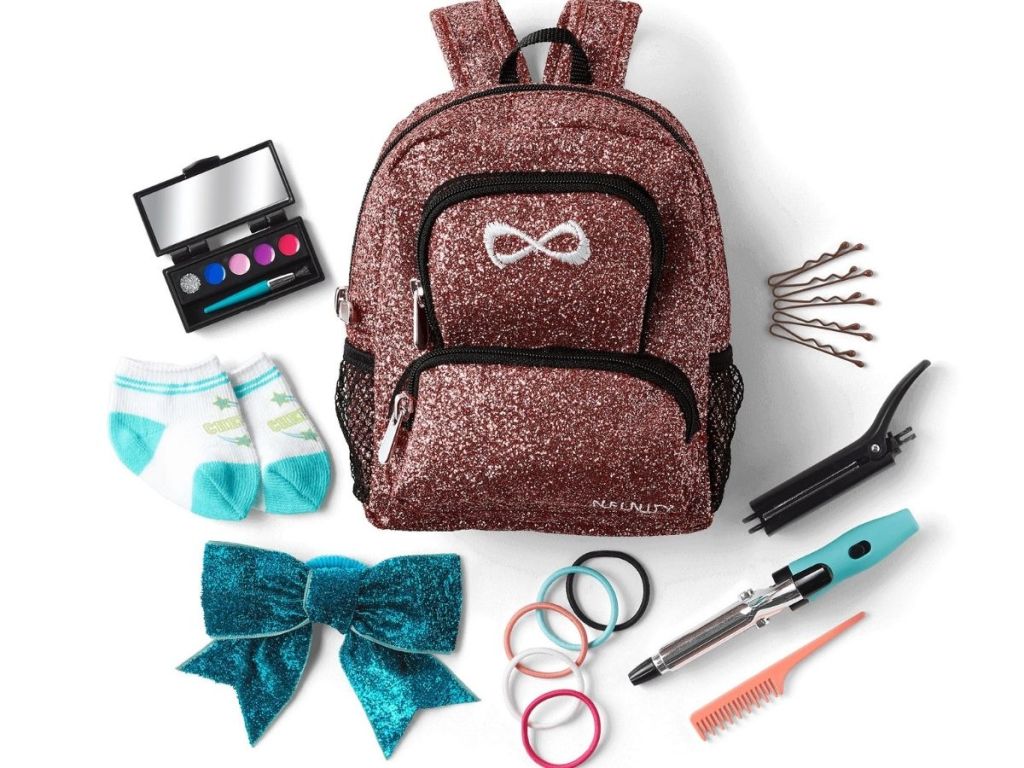 American Girl sparkly backpack with hair and makeup accessoreis