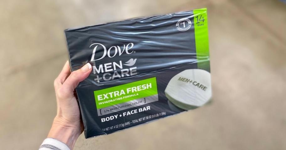 hand holding a Dove Men+Care Body Bars 14-Count box