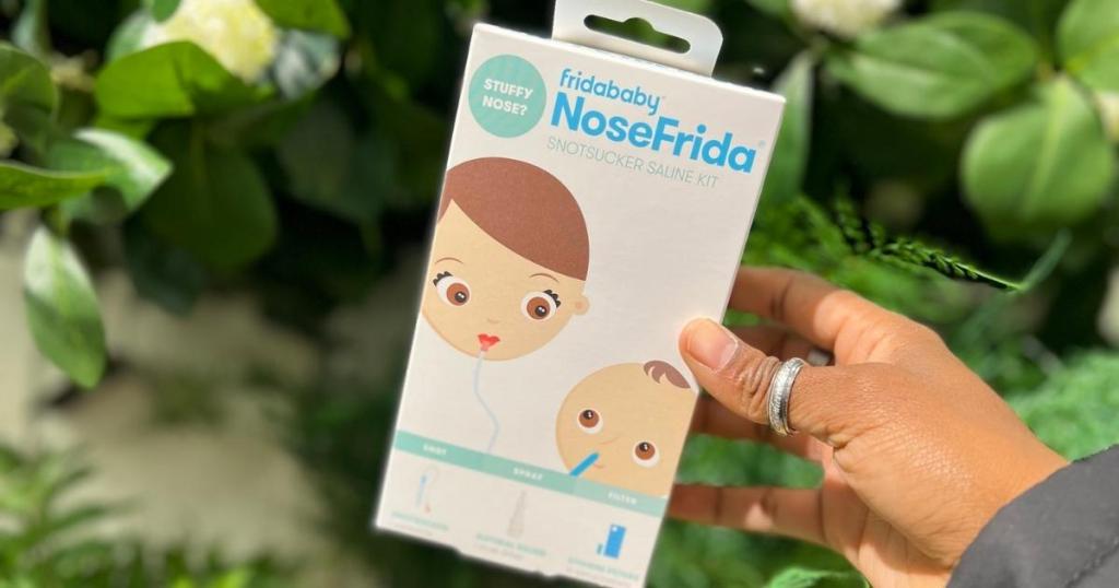 hand holding fridababy fridanose snotsucker box