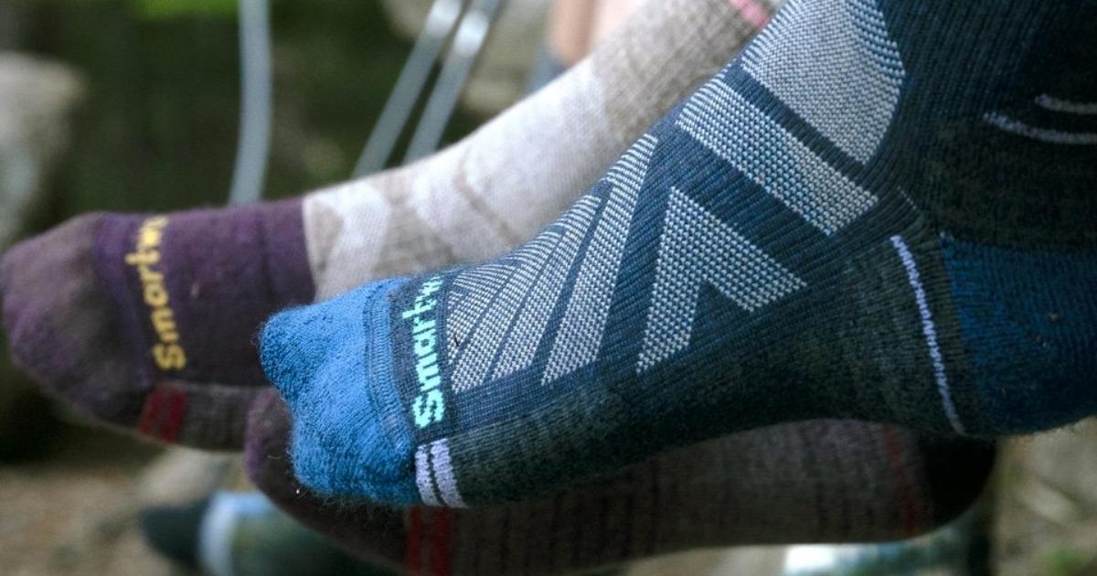 people wearing smartwool socks outside