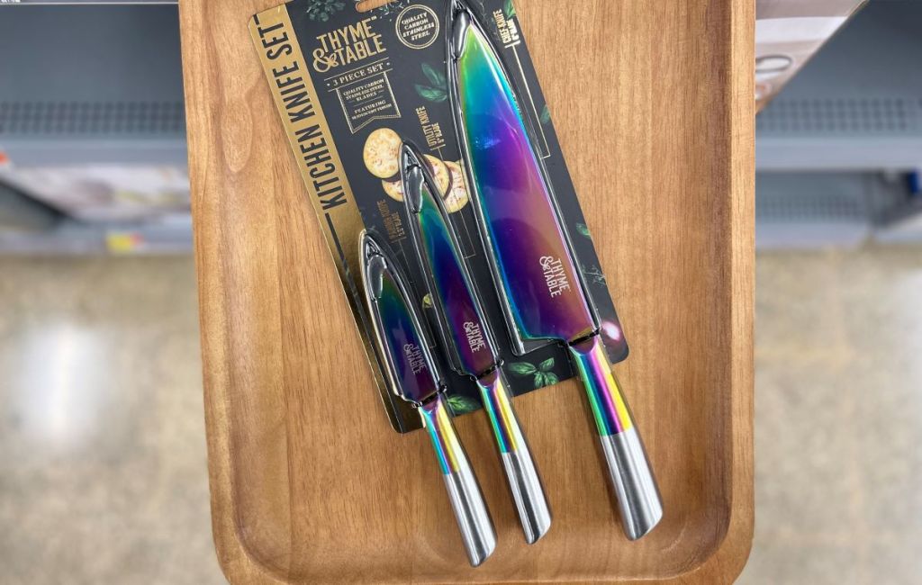 set of knives sitting on a tray