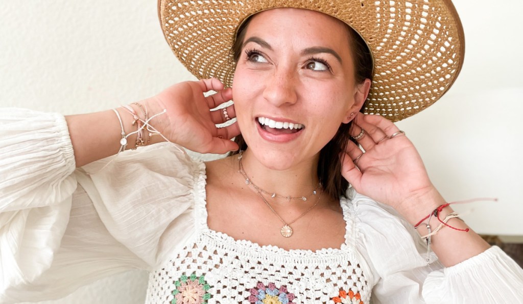 woman wearing pura vida jewelry