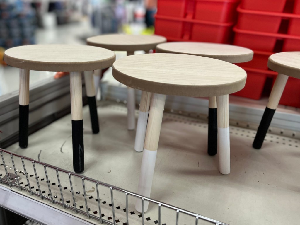 wood risers on store shelf