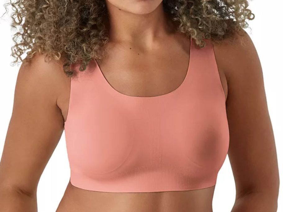 woman wearing a pink seamless Bali Bra