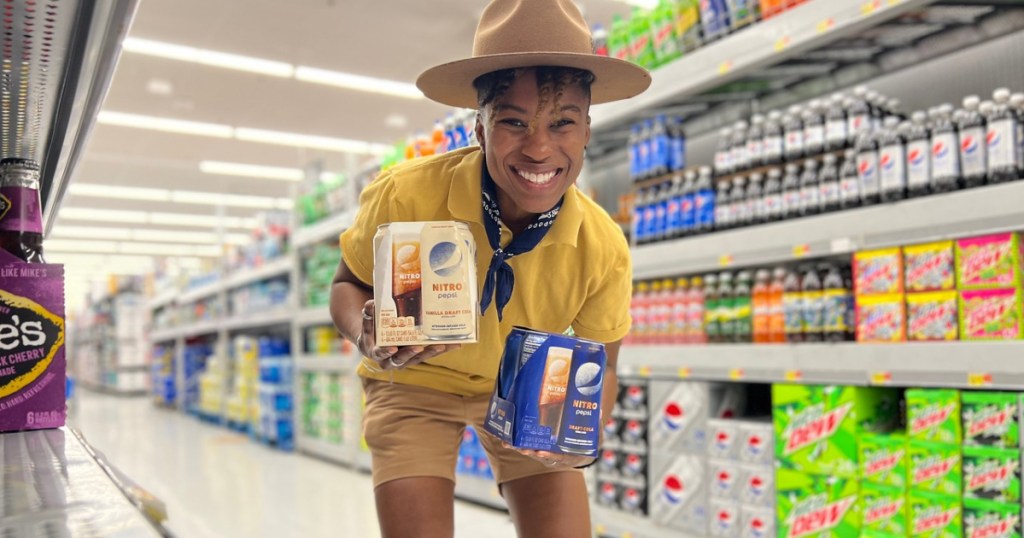 woman holding pepsi nitro packs