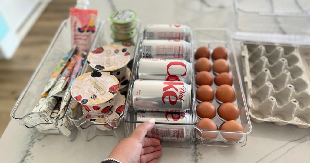 placing food in fridge organization containers