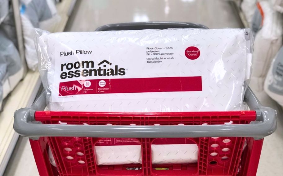 a room essentials standard plush pillow in a Target cart