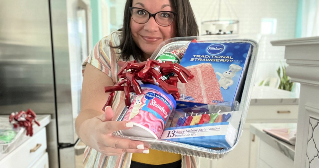 woman holding cake in a box