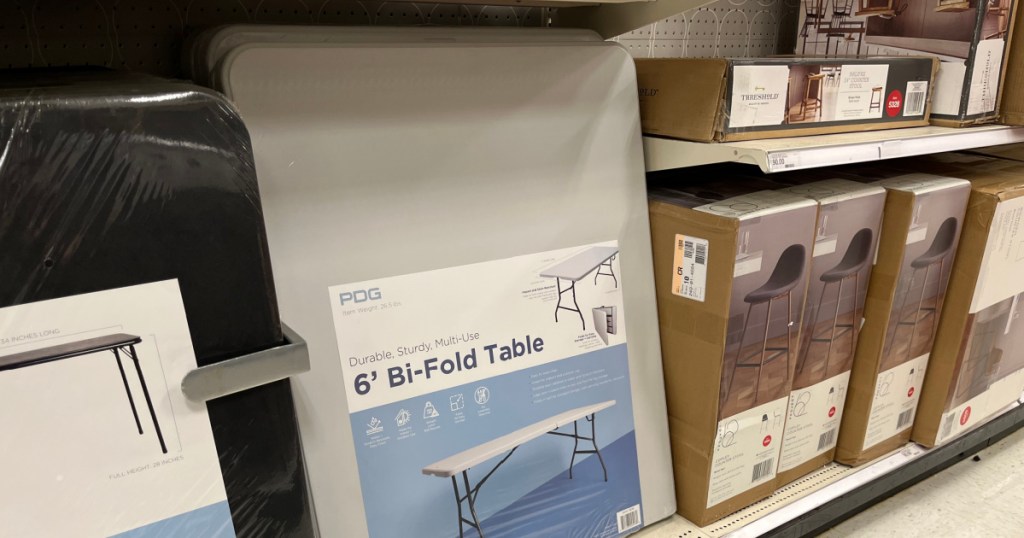 white folding table on shelf 