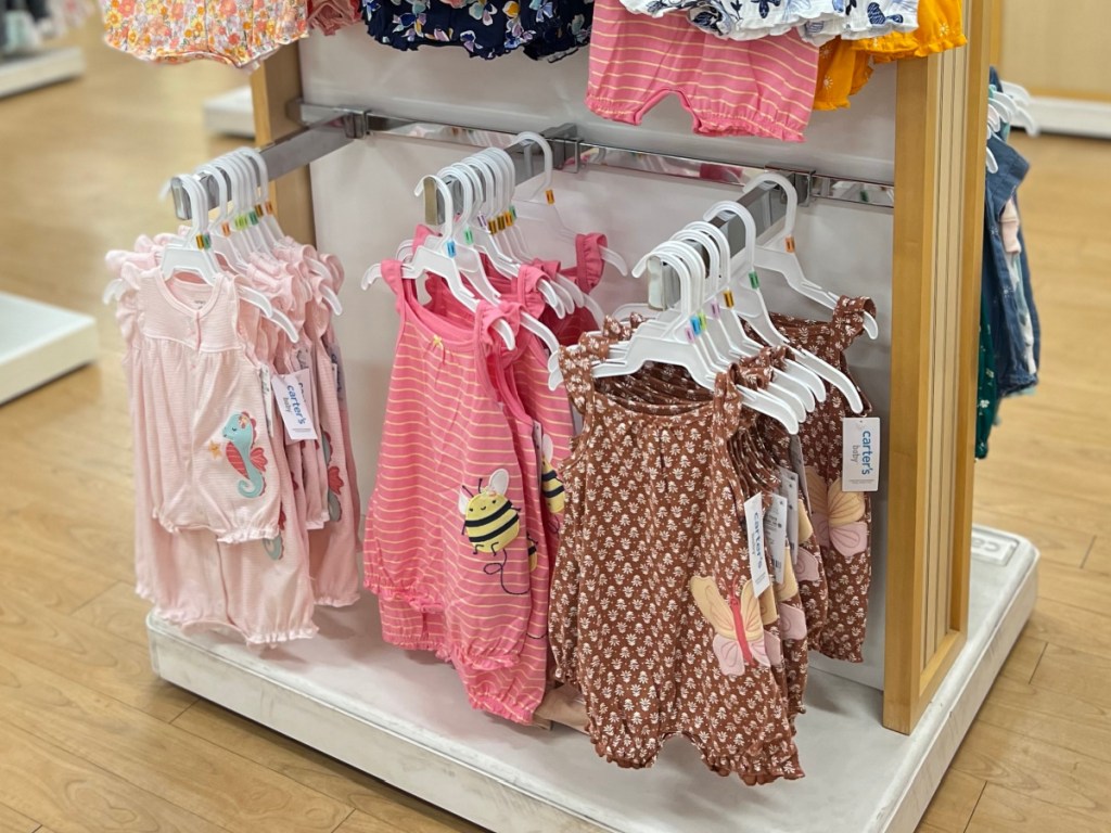 Carter's Baby Rompers on hangers