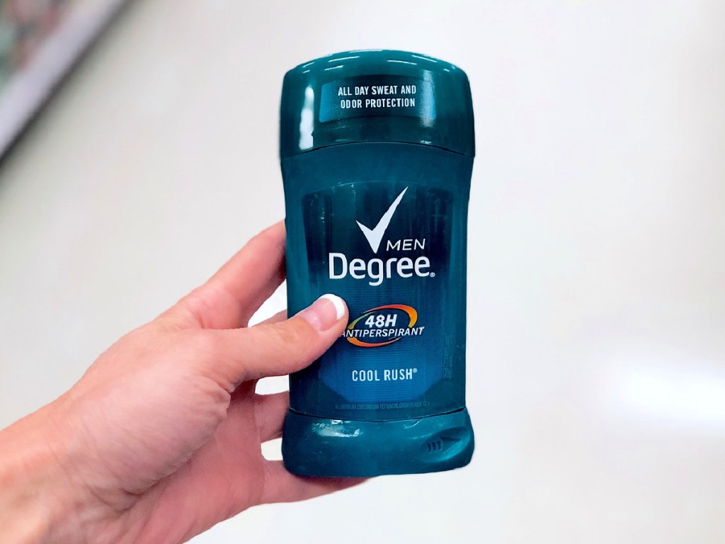 hand holding a Degree Men 48-Hour Antiperspirant & Deodorant in cool rush