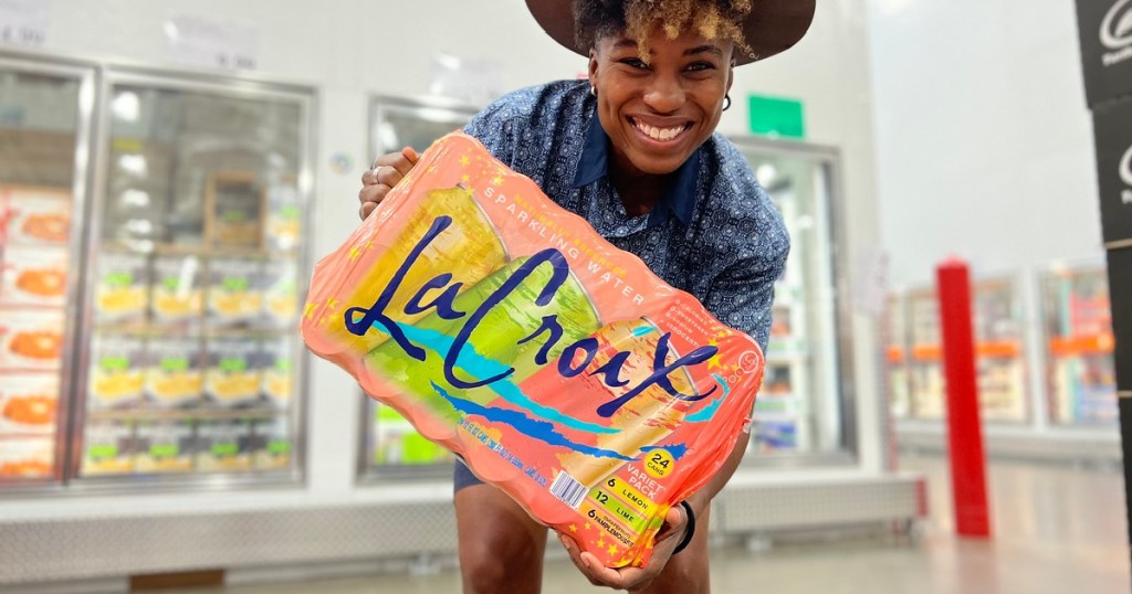 Woman holding a pack La Croix Sparkling Water