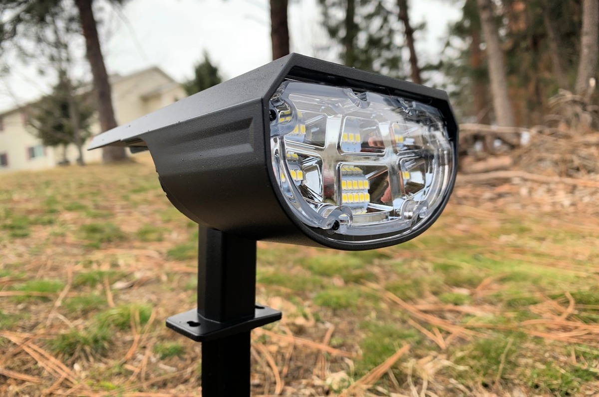 man holding a Solar Outdoor Spot Light