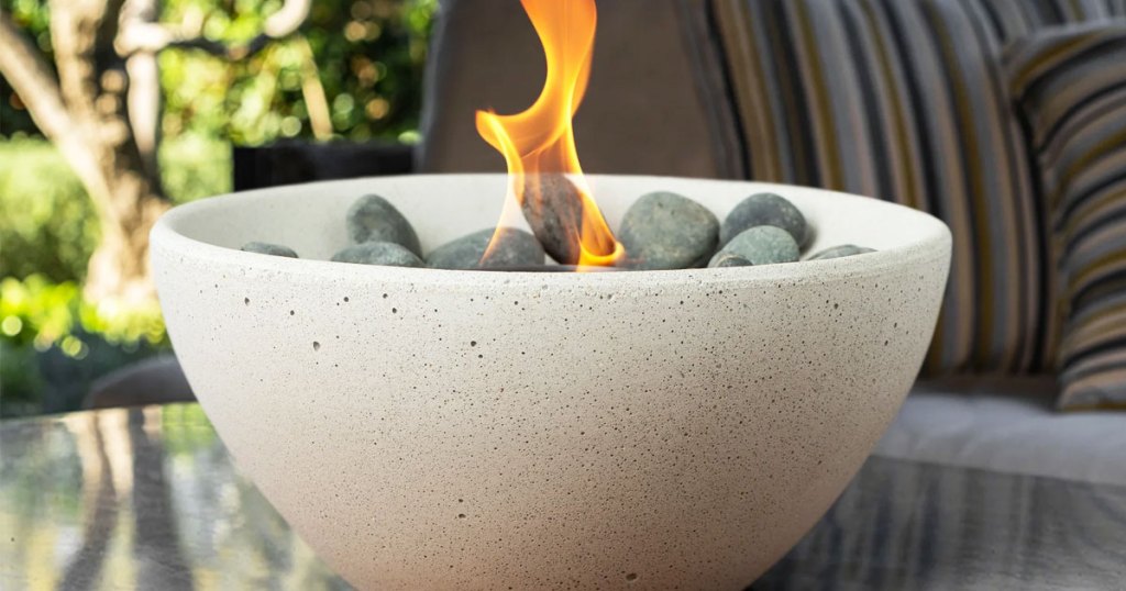 white fire bowl with flame