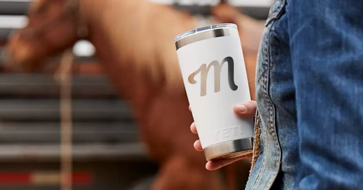 woman holding custom yeti tumbler in hand