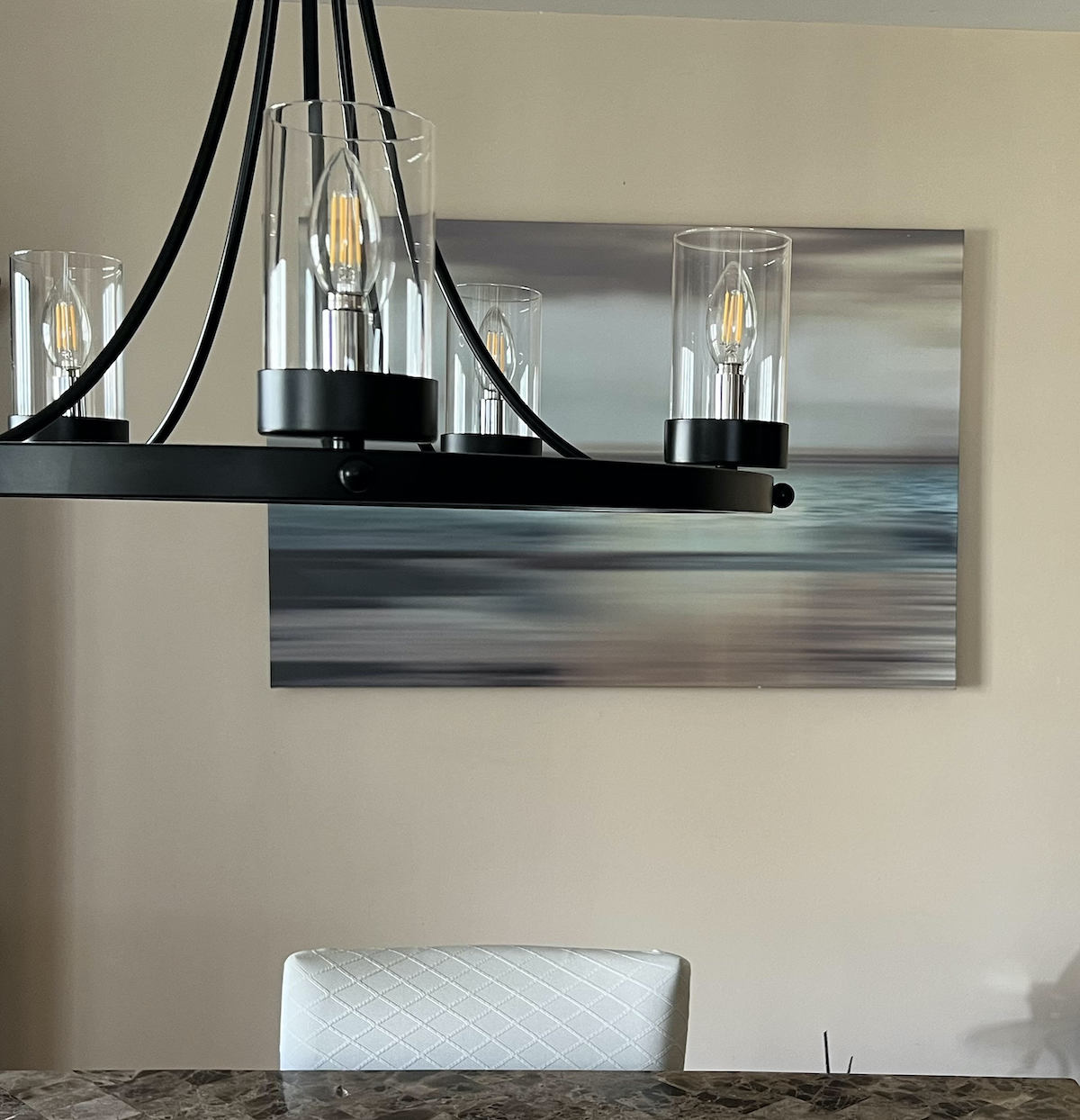 close up of black chandelier in dining room