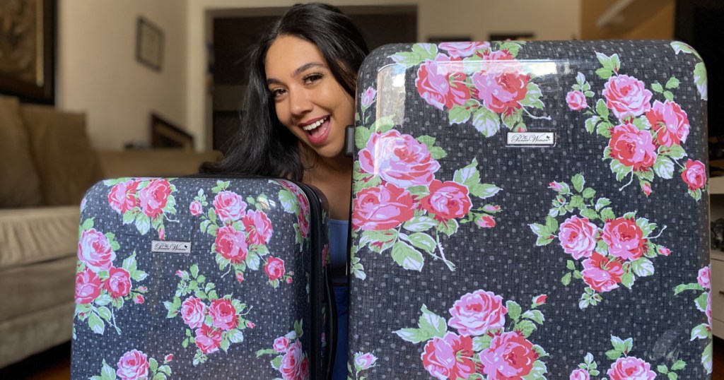 woman with pioneer woman suitcases