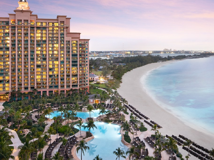 image of Atlantis Bahamas with hotel to the left and beach and pools