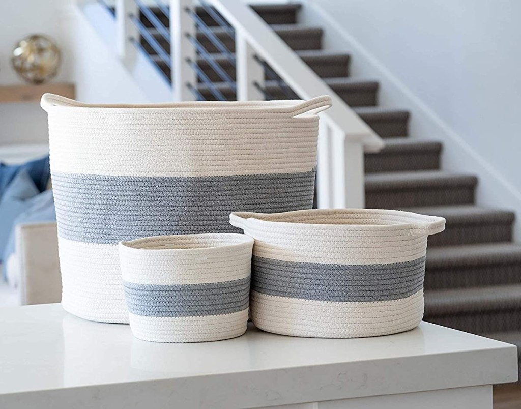 three cotton rope baskets