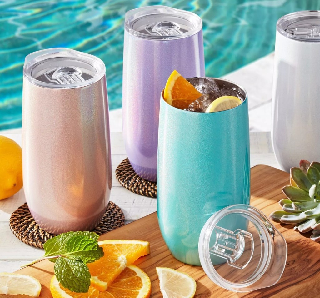 group of tumblers by a pool