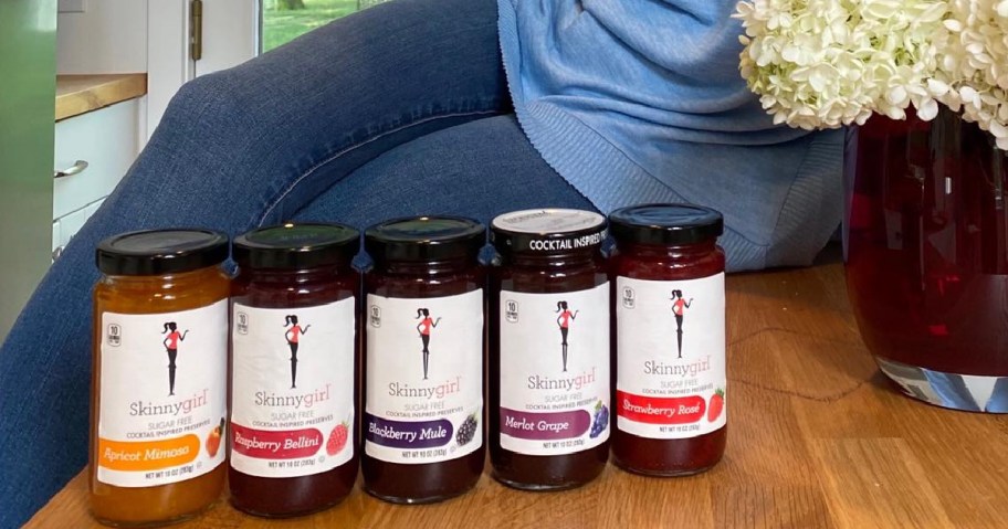 three jars of Skinnygirl Preserves on kitchen counter