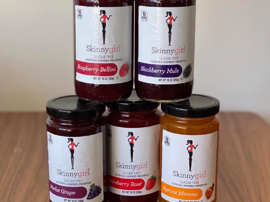 jars of Skinnygirl Preserves on wood table