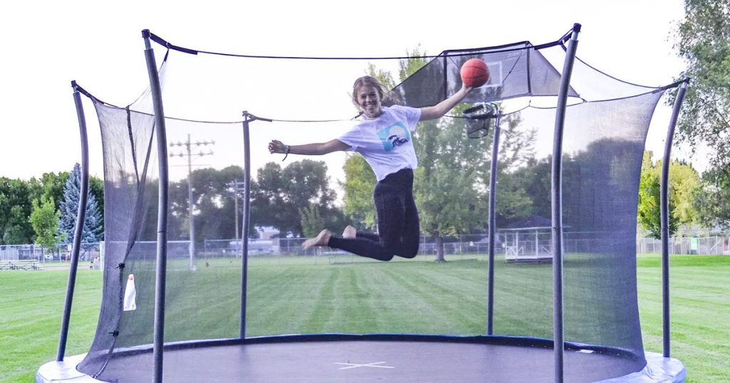 girl jumping on trampoline