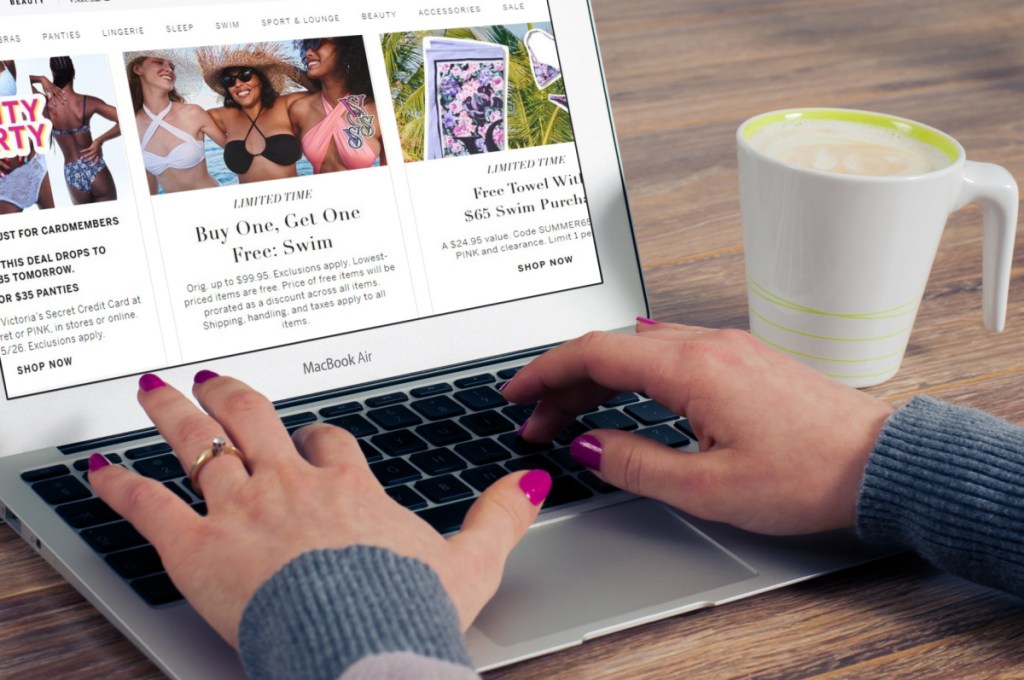 woman browsing victoria's secret coupons online