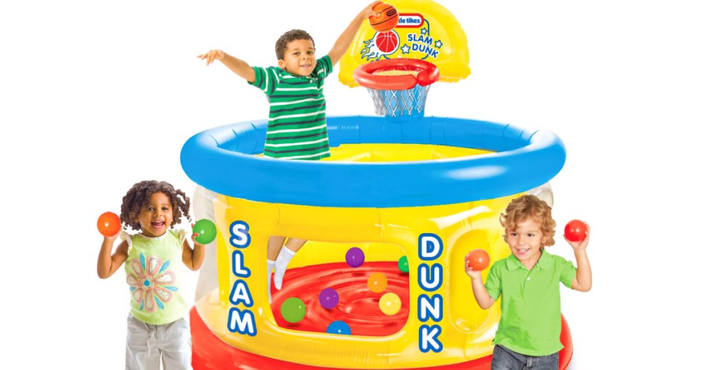 kids playing around a little tikes slam dunk ball pit