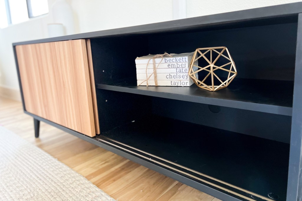 decor on tv stand shelf