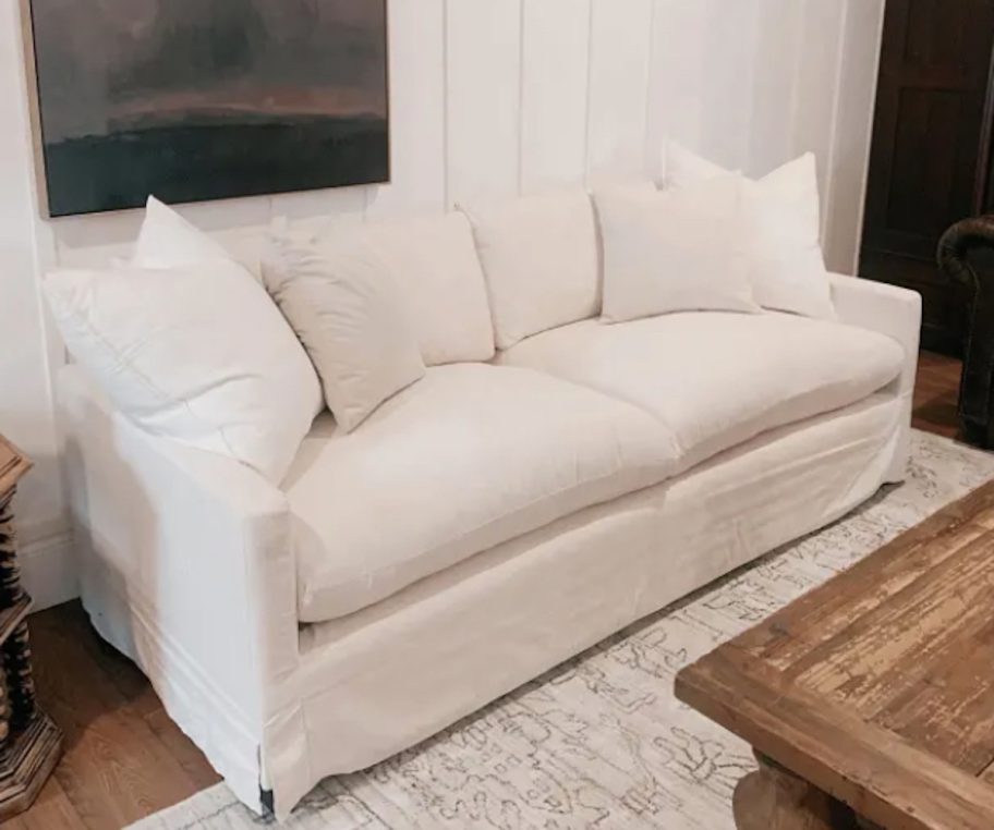 white sofa couch on living room floor