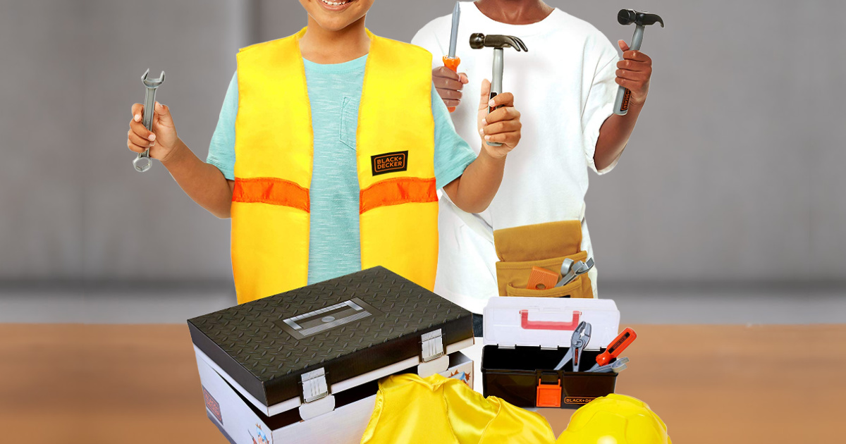 two boys playing with toy construction set