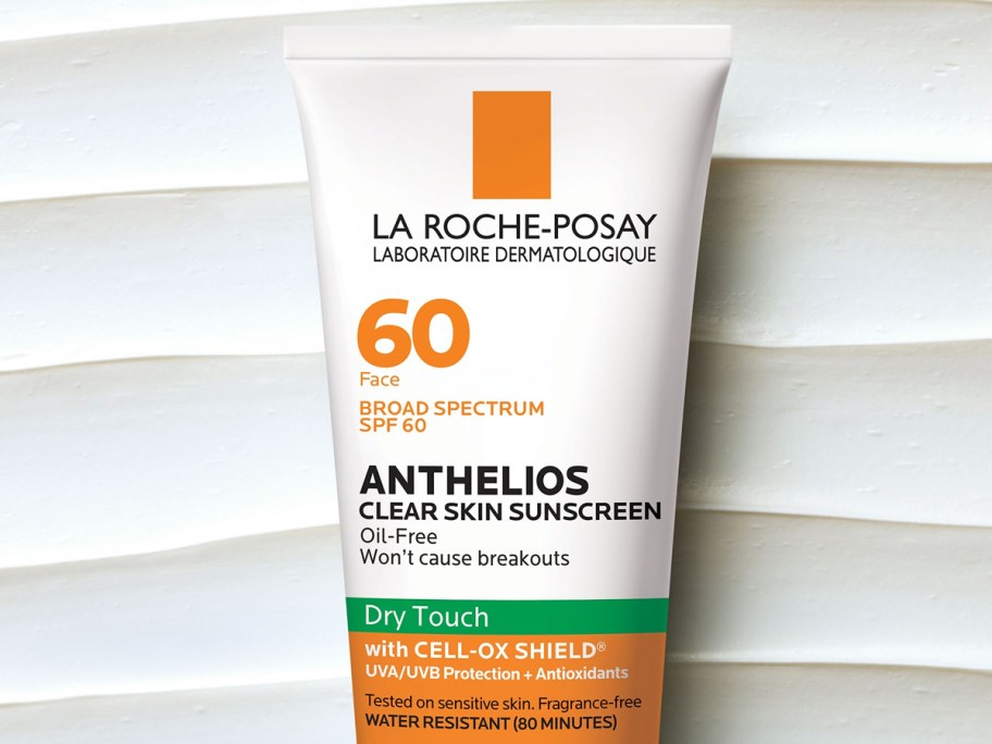 white and orange bottle of La Roche-Posay Anthelios Clear Skin Sunscreen