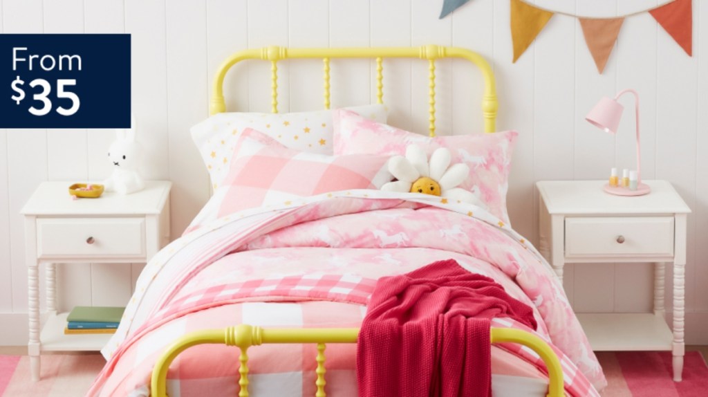 girls bedroom with pink and yellow decor