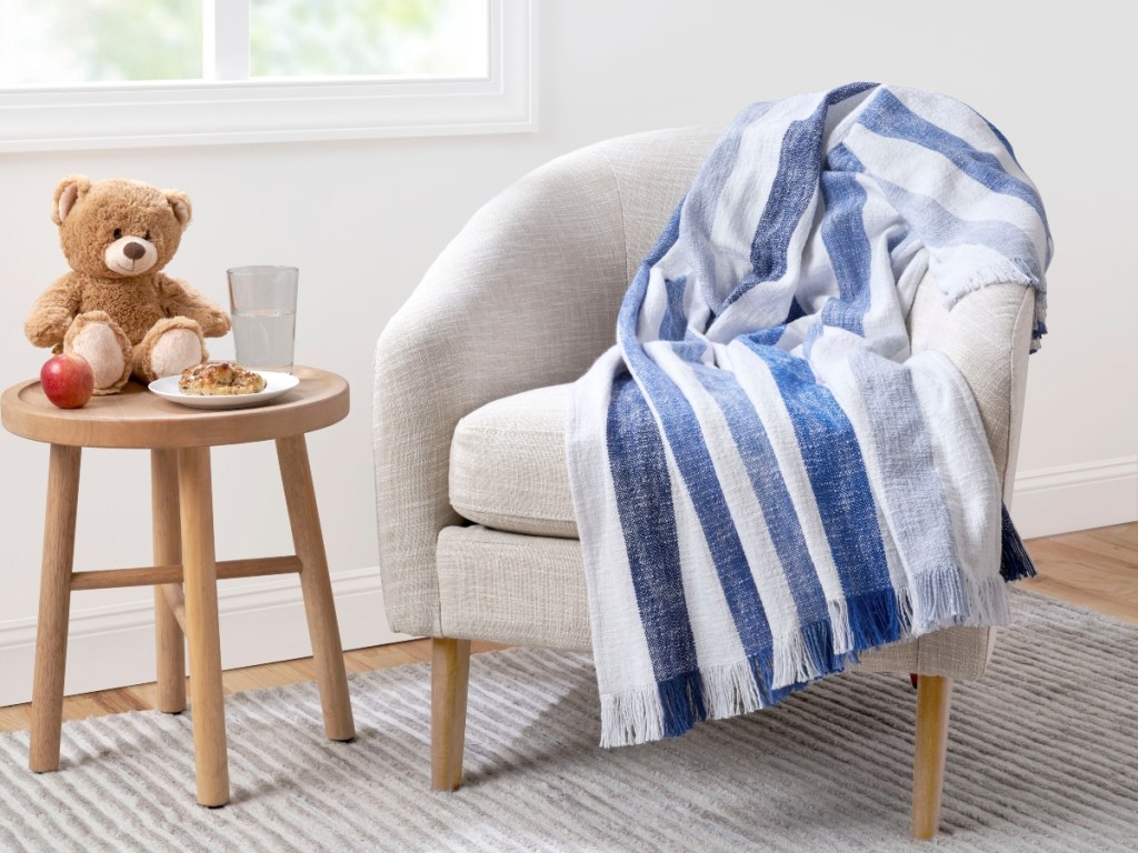 stirped throw on chair in child's room