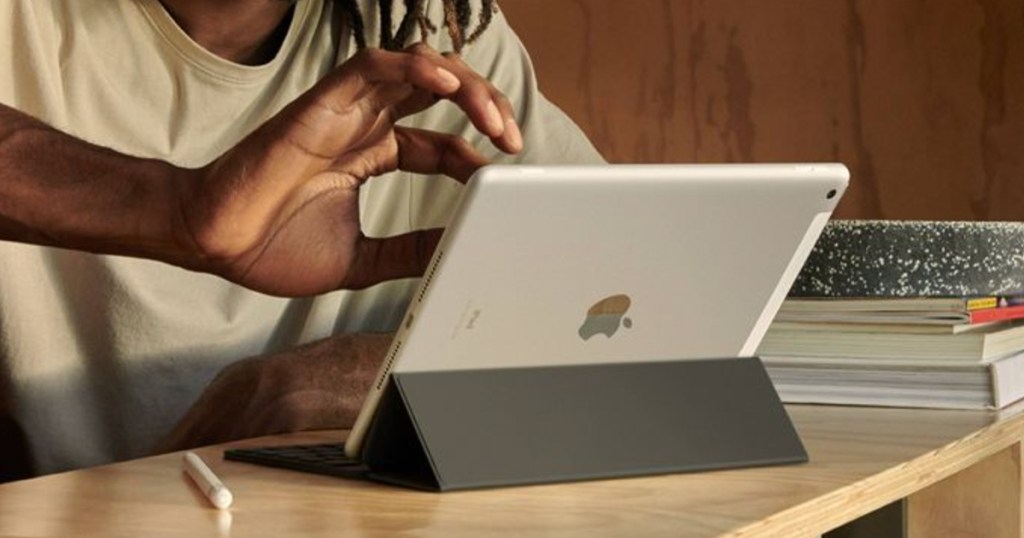 man using gray ipad