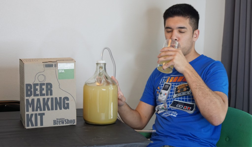 man drinking homemade beer