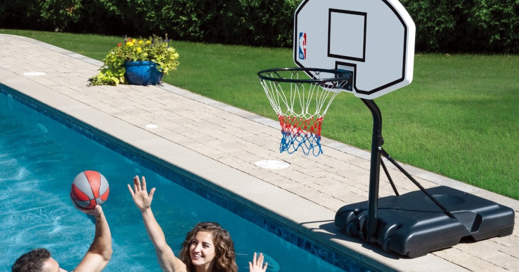 people playing poolside basketball hoop hoop