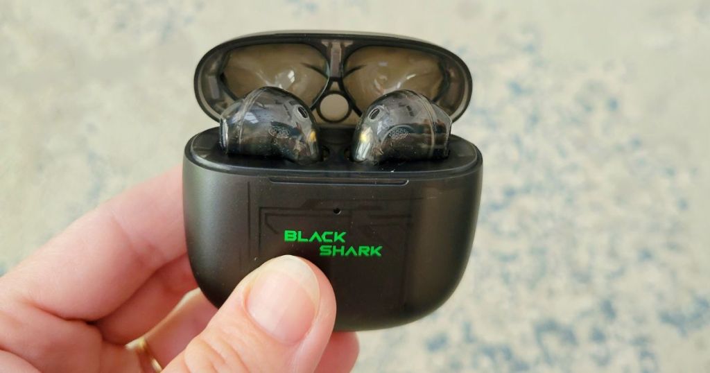 hand holding Black Shark Earbuds